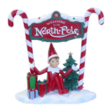 Elf Sitting Under North Pole Sign 25.5cm