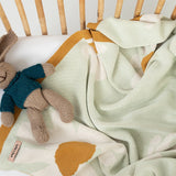 LOLA + FOX DAISY CHAIN COT BLANKET